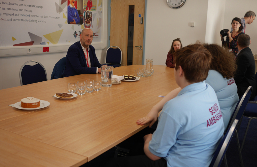 Mark answers questions from Ravenshall School students